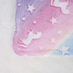 TIAKI Glowing Unicorns hyggetæppe