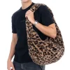 TIAKI skuldertaske